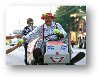 Fat Clown in a parade that brings in attention